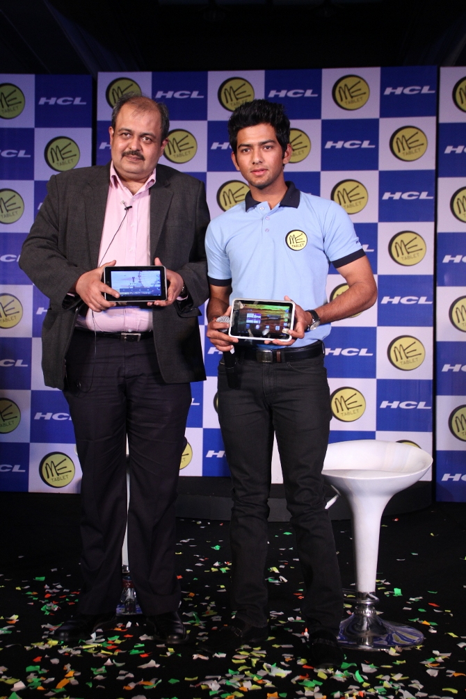Gautam Advani with Unmukt Chand launching new tablet range  (L-R)