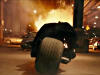 batman_on_motorcycle_blasting_cars_wallpaper_-_1400x1050.jpg